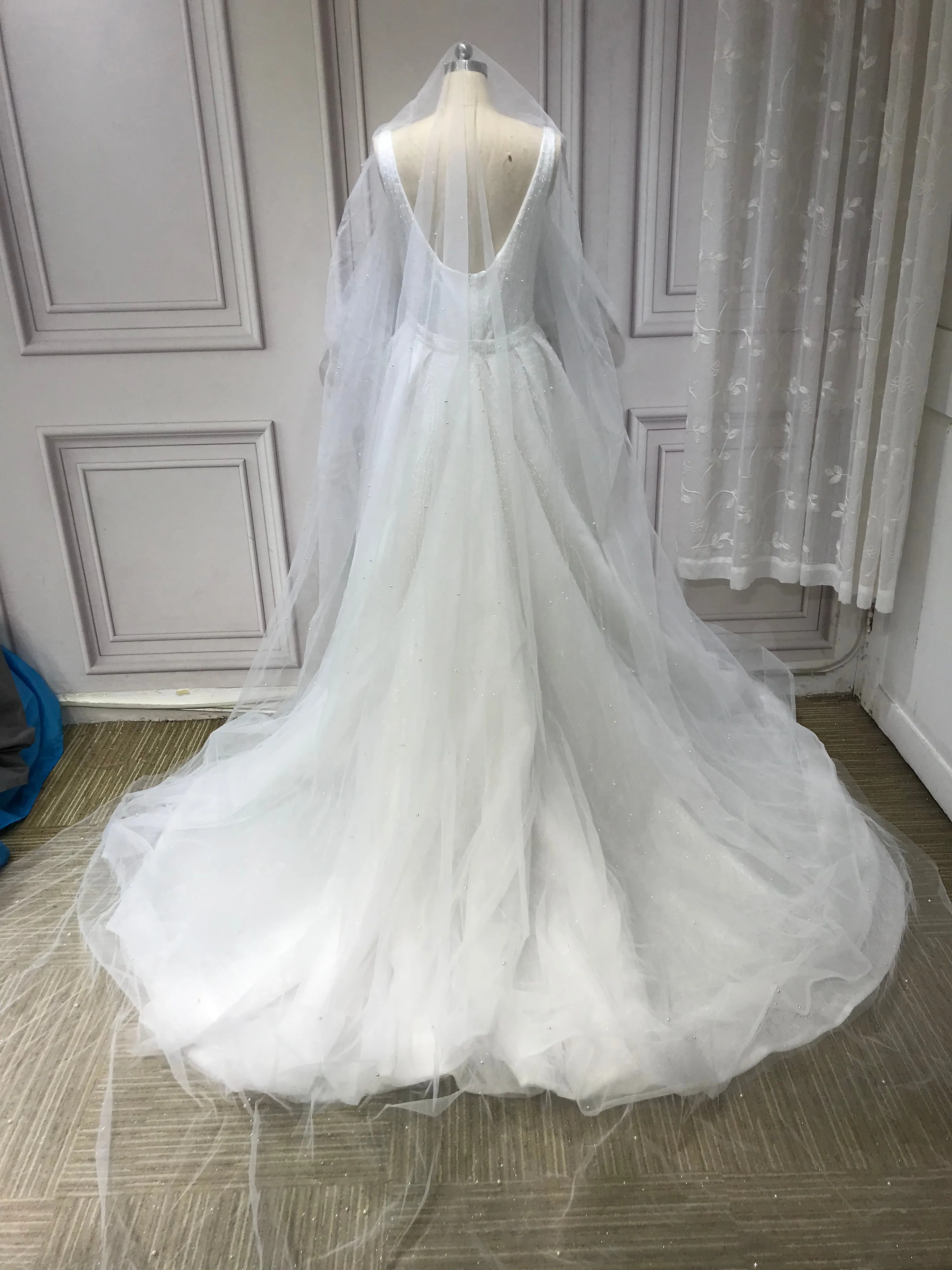 Spaghetti crystals pearls heavy fully beaded mermaid with detachable over skirt two pieces wedding dress 2023